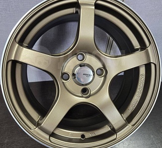 Replica X5130_2733 6,5x15 4x100 ET35 Dia 73,1 (Bronze) X51302733